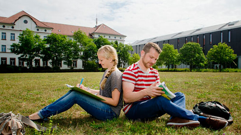 @ Aschaffenburg UAS Two students working on the Campus