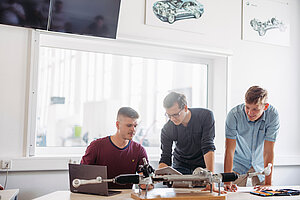 @ Landshut UAS Students working on a modell