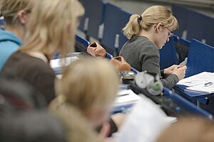 Students working in the lecture hall