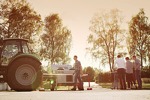 @ HWST Students work with agricultural machines on the campus